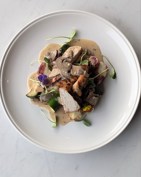 Grilled Chicken Supreme with Roasted Garlic Mushroom Sauce, Grilled Zucchini and Twice Cooked Smashed Red-Skinned Potatoes